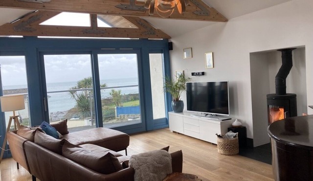 Family beach house w/hot tub, easy beachfront access, and sea views!