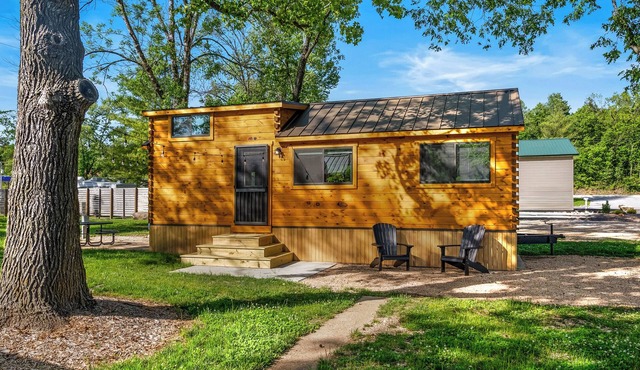 Family cabin on a creek with hot tub, grill, and close access to Branson, MO.