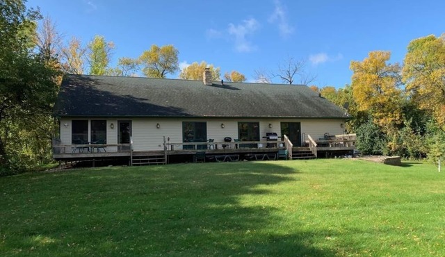 Family cabin situated between two lakes and next to acres of private woodlands.