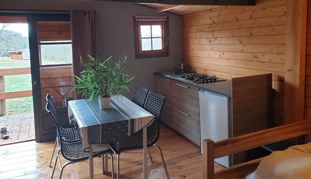 Family chalet in a small nature campsite