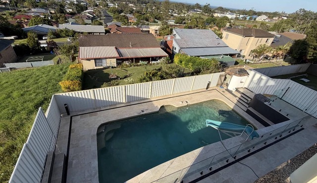 Family Coastal Retreat with Pool and Balcony Views