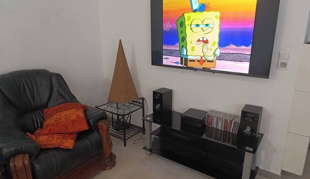 family cottage with a backyard