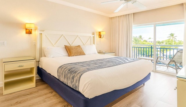 Family-Friendly 2BR Suite w/Kitchen & Balcony | Steps from the Pool & Beach!