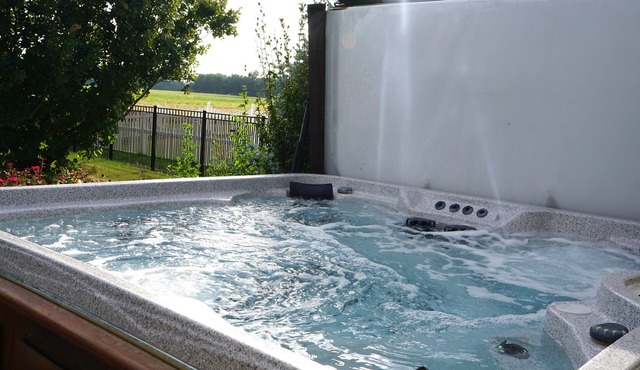 Family Friendly 4 Bedroom, 3 Bath Family, Hot Tub and playground. Sleeps 12