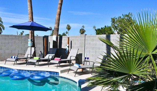 Family-friendly 4 bd with sparkling heated pool, putting green, games. ASU close