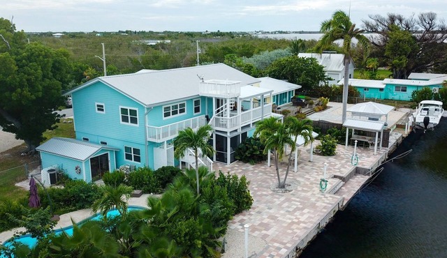 Family friendly canal home,150 ft dock, easy access to Atl & Gulf