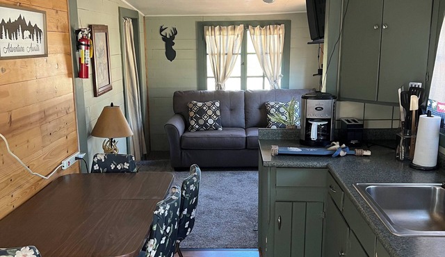 Family friendly cabin close to playground. Amazing swimming beach
