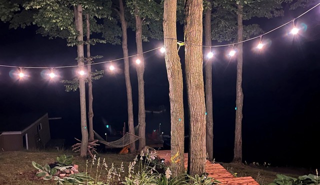 Family friendly cottage on Buck Lake with sandy beach and amazing sunsets!