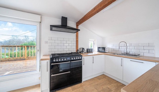 Family-friendly countryside home with hot tub, swing set and trampoline