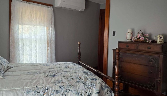 Family-friendly farmhouse property, rural setting, 10 minutes from Tiffin, OH.