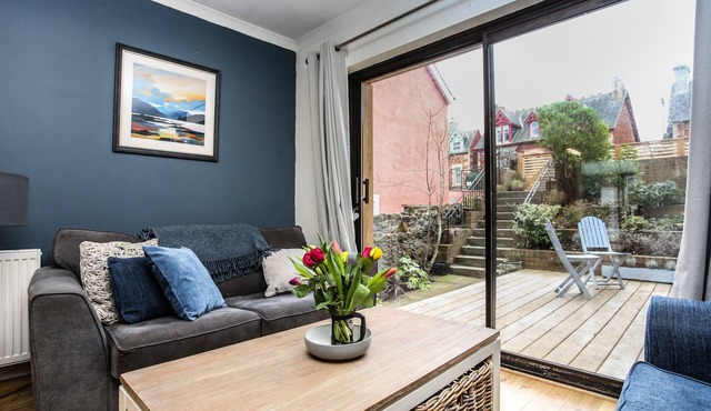 Family-friendly apartment with an attractive garden and private parking.