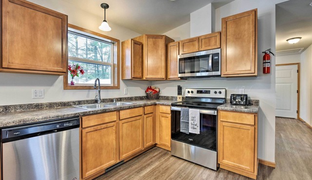 Family-Friendly Getaway with Tainter Lake Access!