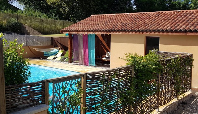 Family friendly Gite with large heated pool (Salt) and garden with games area