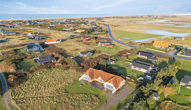 Family-friendly holiday home with pool, located close to the North Sea in Vrist.
