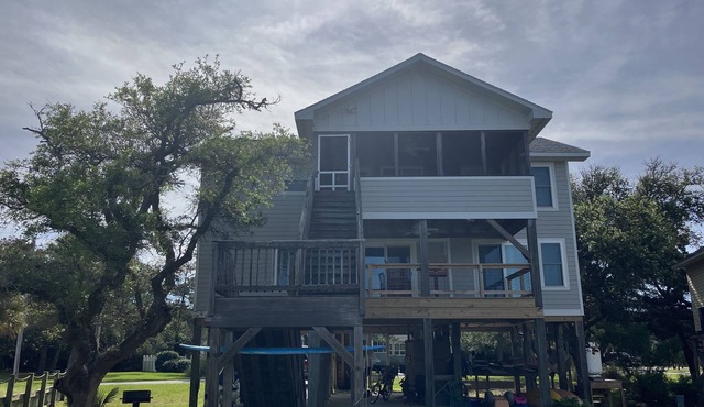 Family friendly home located directly on a canal with sound access and dock!