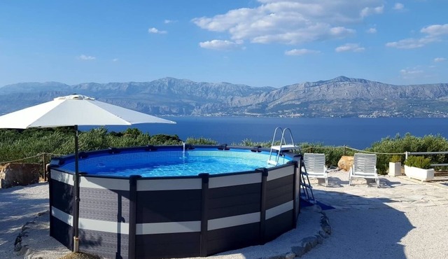 Family friendly house with a swimming pool Postira, Brač (K-11742)