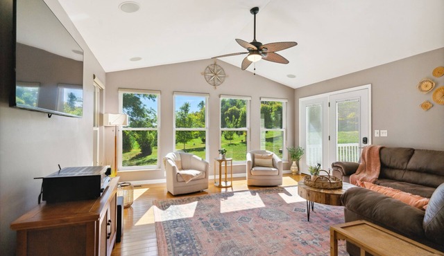 Family-friendly house with large deck & yard adjoining local Christmas tree farm