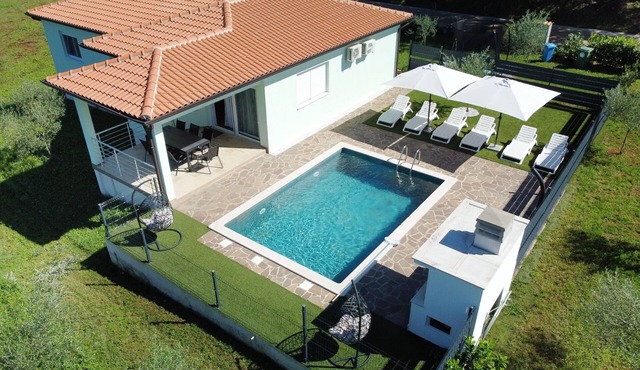 Family friendly house with a swimming pool Buroli, Umag (K-22400)