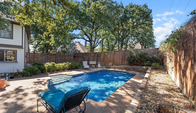 Family Friendly Hurst Home with Salwater Poo,l Fireplace, and Spacious Layout