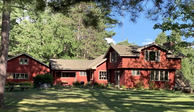 Family friendly lakefront property on large wilderness estate with sandy beach