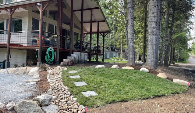 Family-friendly lakefront cabin setting with beach and boatslip.