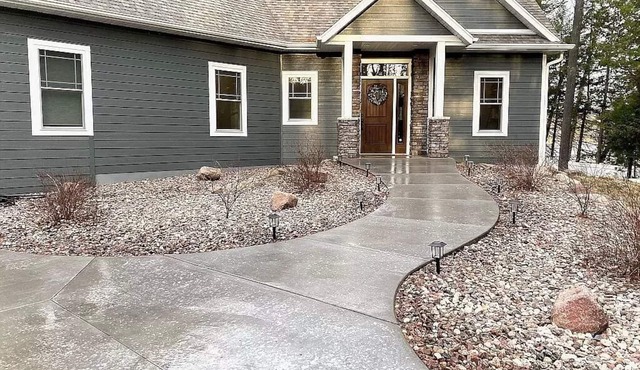 Family Friendly lake home, beach, level lot, fire pit, game room, dog friendly!