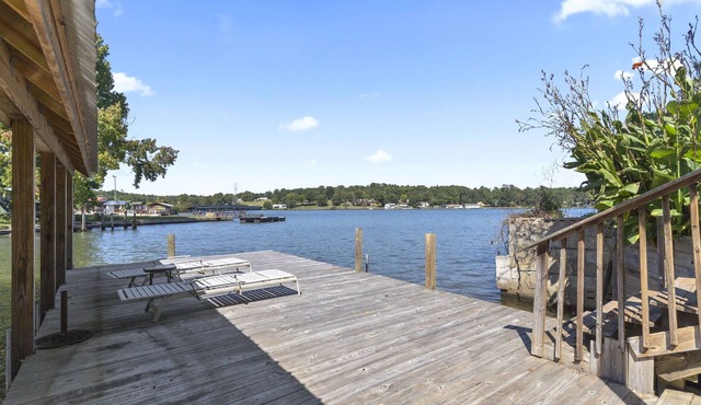 Family - Friendly Lakefront Home with a Covered Boat-slip.