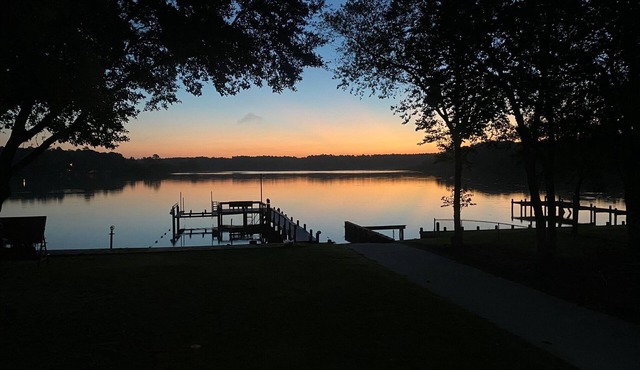 Family friendly lakefront home with private boat ramp and dock