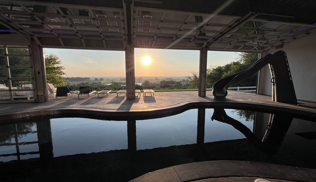 Family-Friendly Nebraska Estate with Scenic Pool, Gym, Theater & Fire Pit Fun