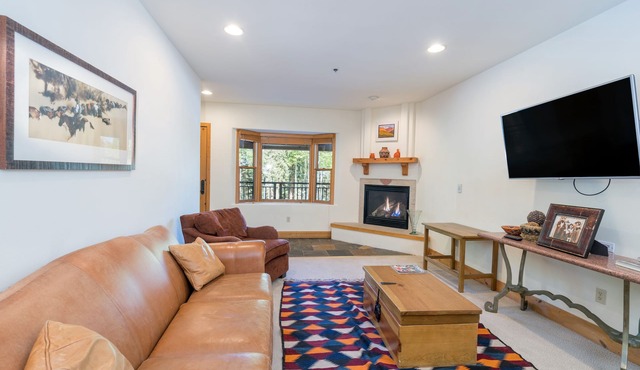 Family-Friendly 2-Bedroom Condo Tucked in the Woods