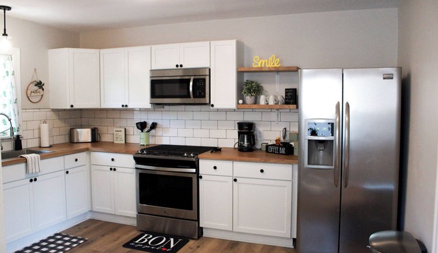 Family FUN at this 2 bed/fenced yard/game room home near the Dunes!