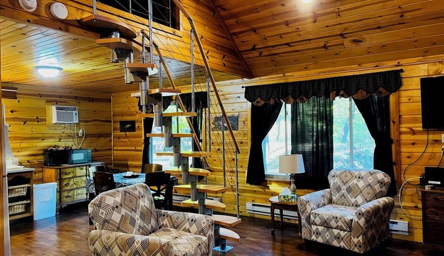 "Family Fun by the River: Sleeps 9, Pet-Friendly Cabin!"