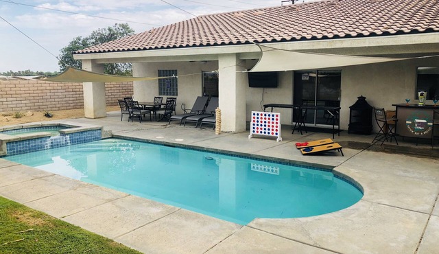FAMILY FUN spacious 4 bedroom home with pool/spa, bbq, game room & 8 beds