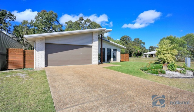 Family home overlooking park land