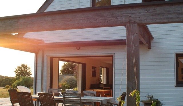 Family home with multiple living spaces, open views and stunning sunsets