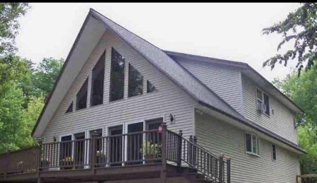 Family Retreat! Large Game Room, fenced in yard with hot tub and fire pit.