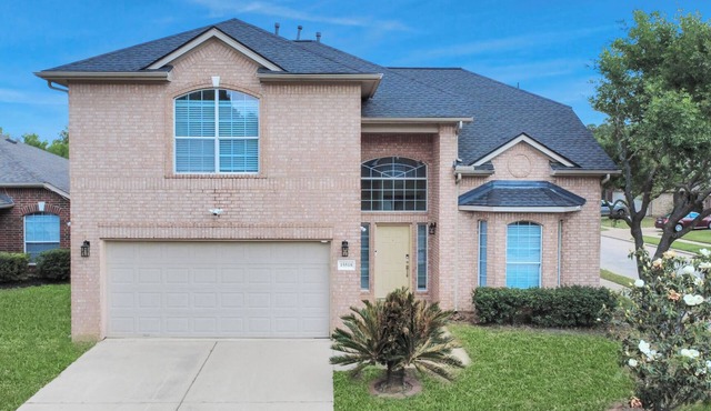 Family retreat with game room and huge yard.