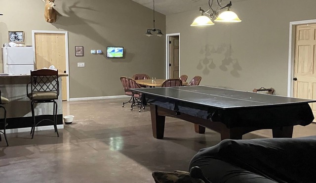 Family Retreat with pond, pool table and double bunks.