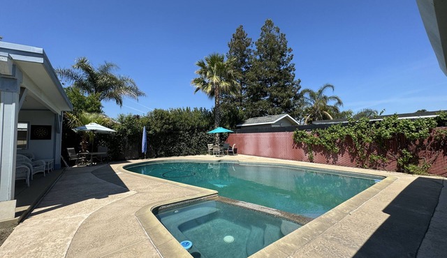 Family Sized home w/Pool, Pool table, ping pong & darts in a central location!