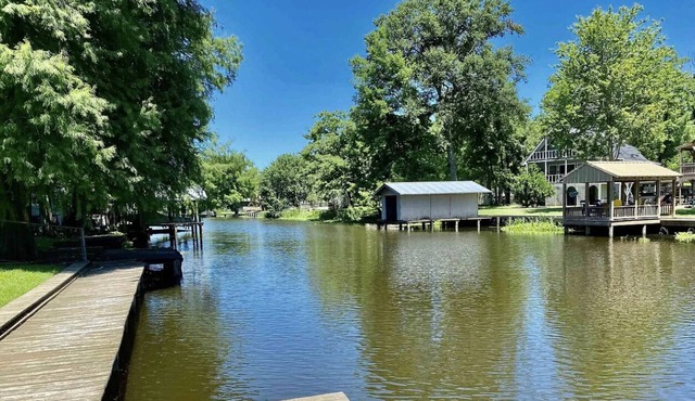 Family style home- Fenced in back yard on the bayou with access to False River -