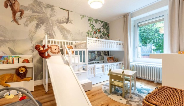 Family Suite · Familienwohnung mit Rutsche