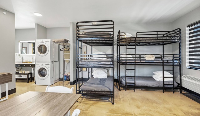 Family suite with full kitchen and laundry on the second floor of The Landing Hub Hotel