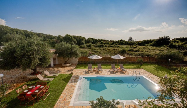 Family Villa SKALES, with a private pool right by Almyros sandy beach !