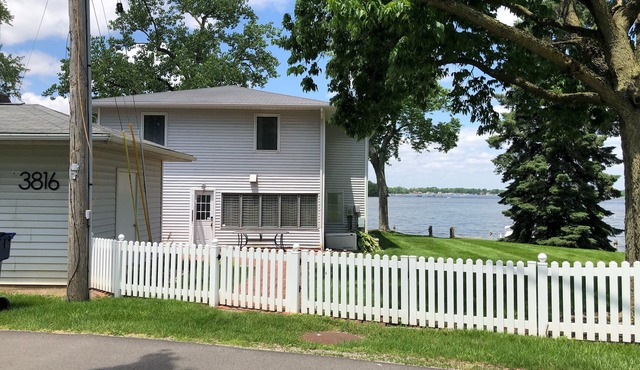 Family Waterfront Lakehouse with Large Side Yard and Picture Perfect Sunsets!