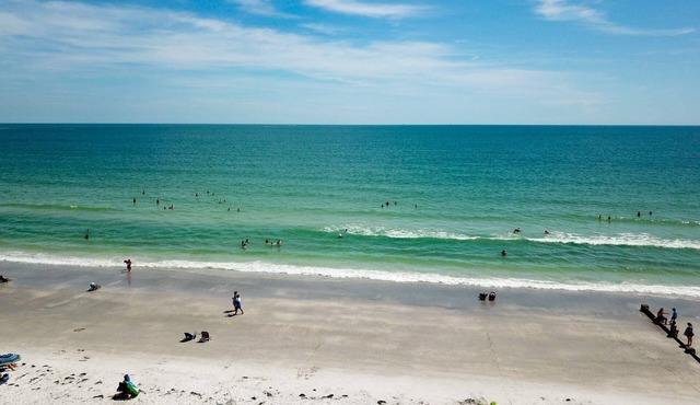 Fantastic Beachfront Resort. Roomy and Comfortable. Take a Stroll along Beach or Lounge at the Pool.