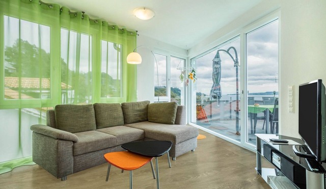 Fantastic Holiday Apartment "Lilie" with Large Balcony, Lake View, Wi-Fi & TV