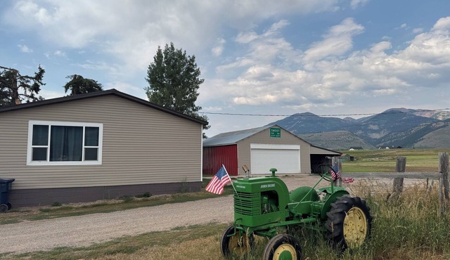 Farm house in Smoot. Close to hiking, snowmobiling, atv, and hunting spaces.