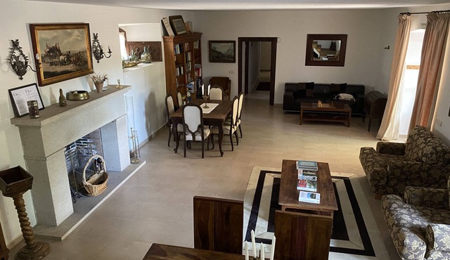 Farm of 3 has fenced, with two-story house and stables with dressage track