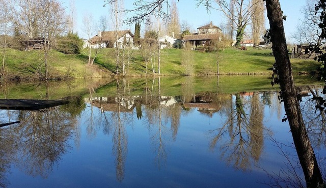Farmhouse in the middle of the horses