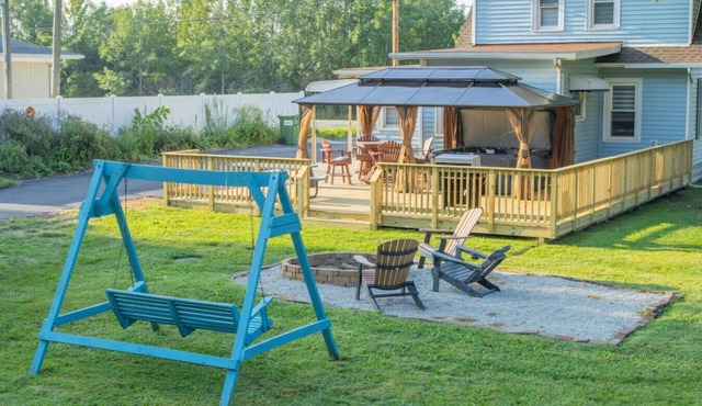 farmhouse/hot tub by Camp Perry